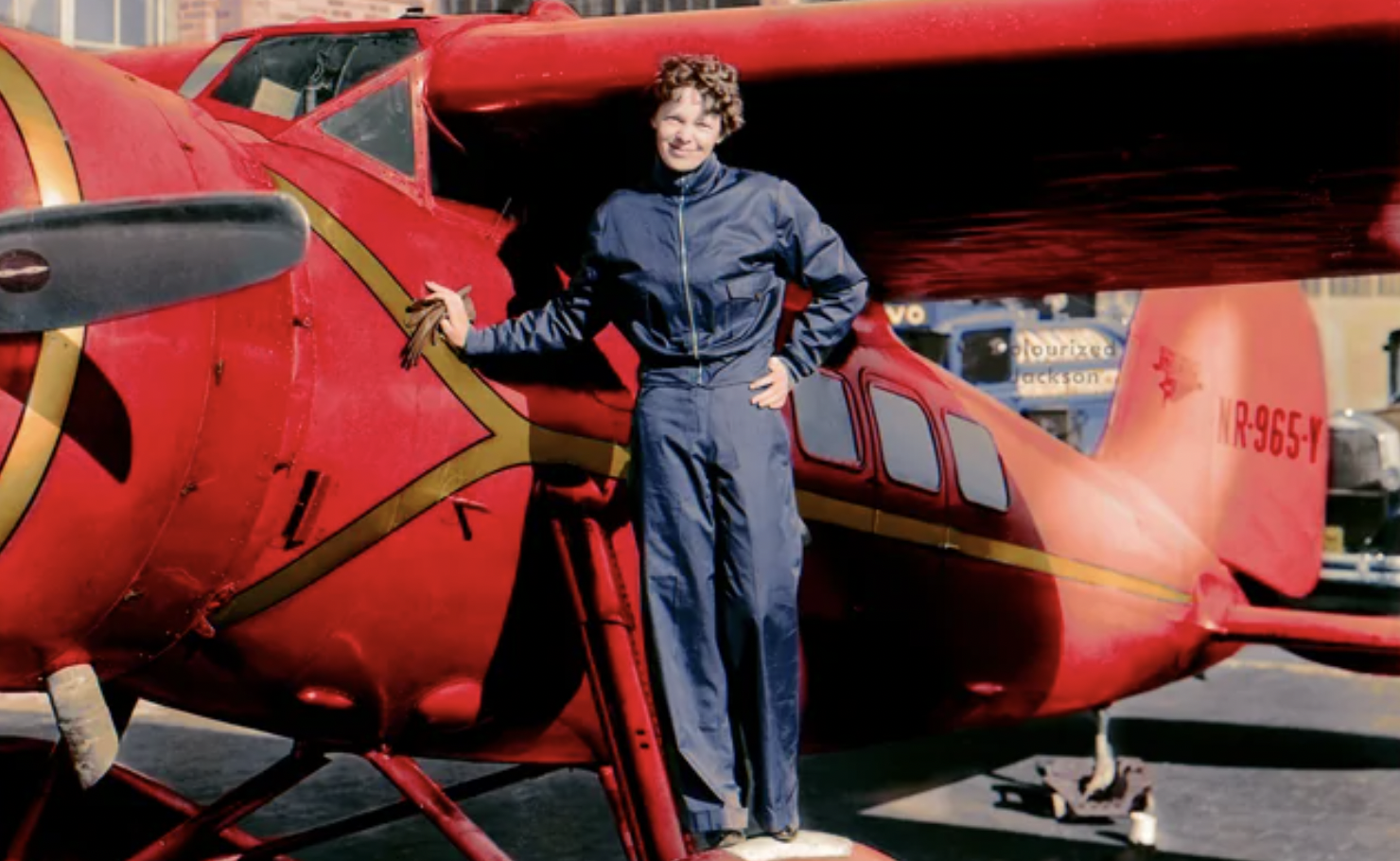Amelia Earhart photographed by her plane in 1932.