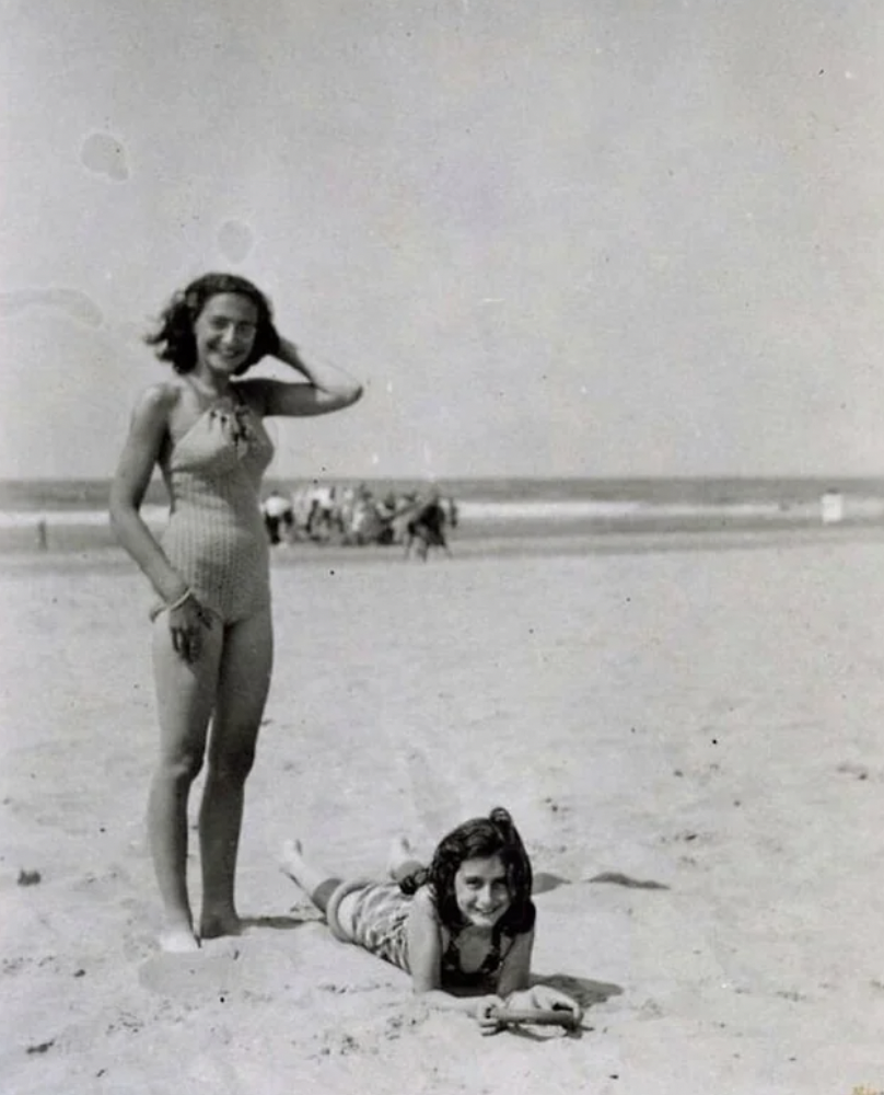 Anne Frank, with her sister Margot at Zandvoort Beach, 1940.
