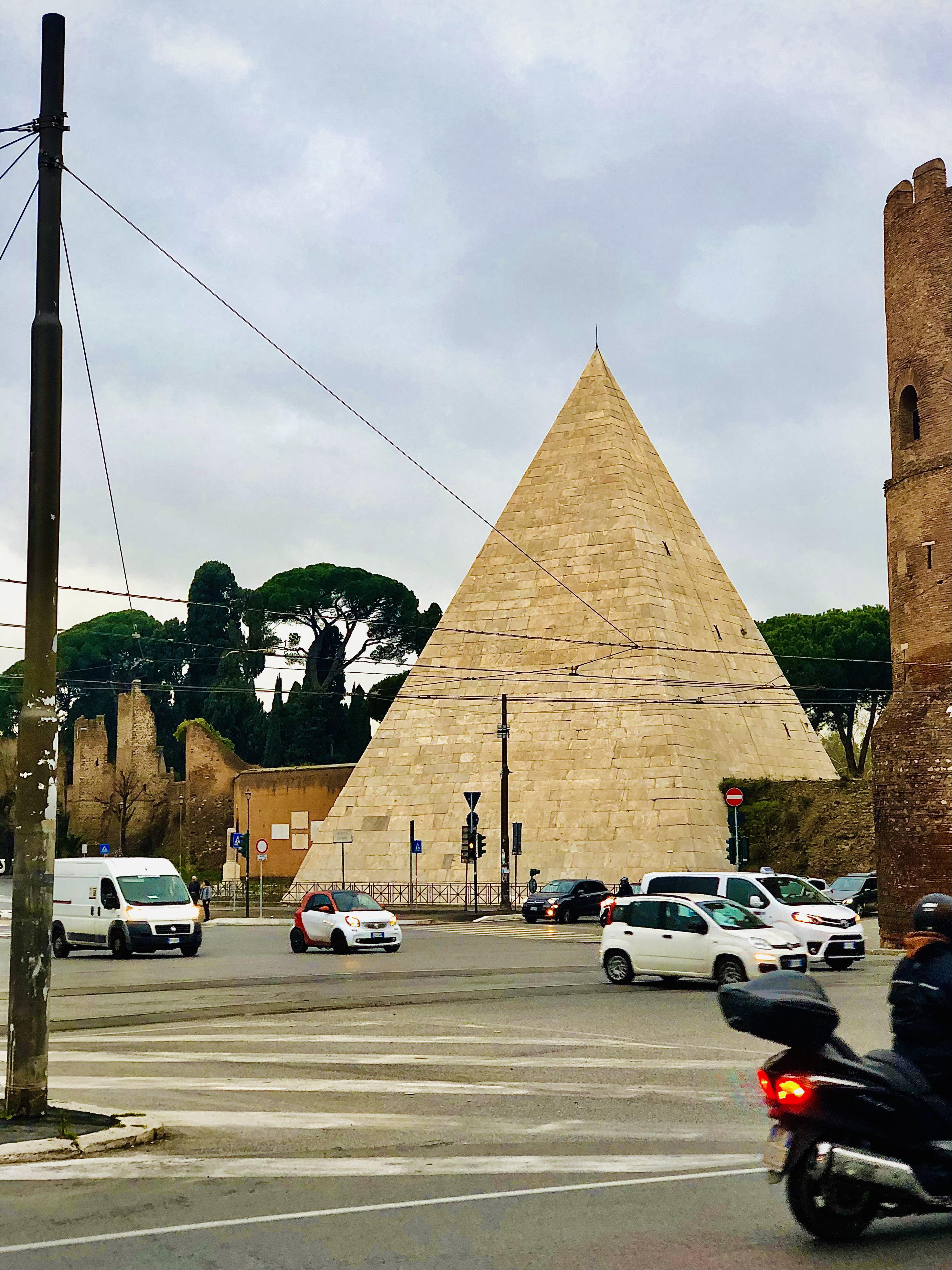 Pyramid of Cestius, built as a tomb for the Roman preator Gaius Cestius ca. 12 BC. Later incorporated into the Aurelian Walls, as a triangular bastion. Rome, Italy