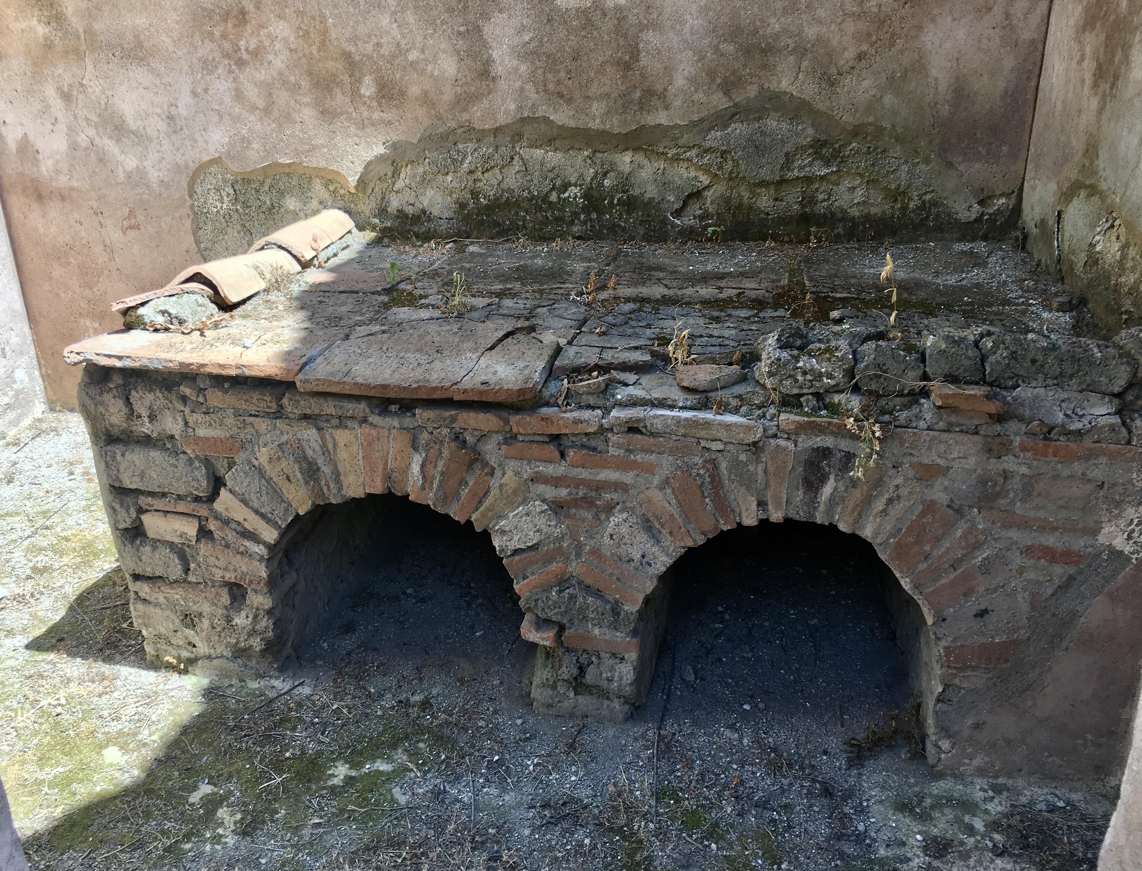 Ancient Roman kitchen hearth from a 13-room, 4,200 square-foot home in Regio XI of Pompeii, Italy, circa 1st century CE.