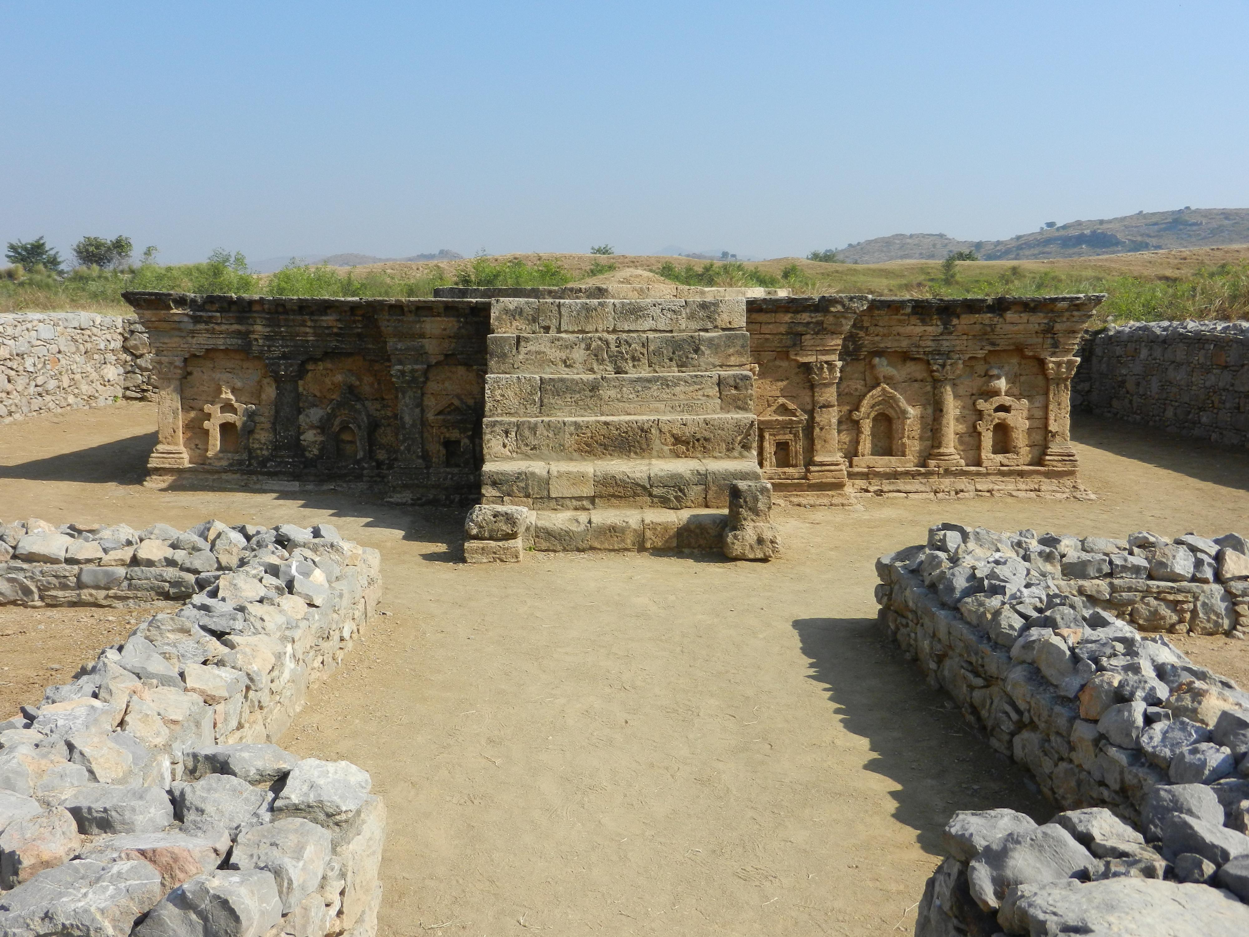 The Double-Headed Eagle Stupa was a public shrine which housed religious relics during the Indo-Scythian stage at Sirkap, showcasing Buddhist, Hellenistic, and even Babylonian artistic influences in South Asia. The settlement was previously Greco-Bactrian. 1st century BCE. Taxila, Pakistan.