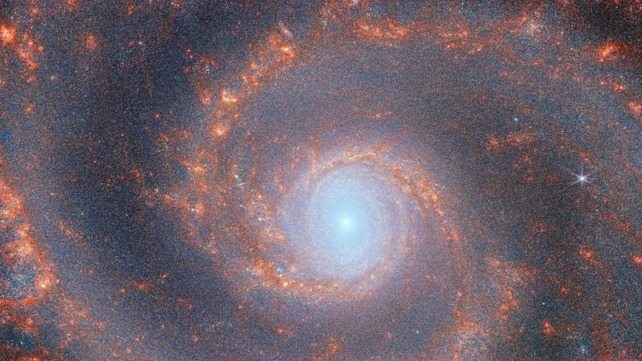 This view of M51 was taken by Webb's Near-Infrared Camera (NIRCam). While MIRI brings out the web-like structure of the dust in the galaxy, NIRCam focuses more on ionized gas from newly formed star clusters.