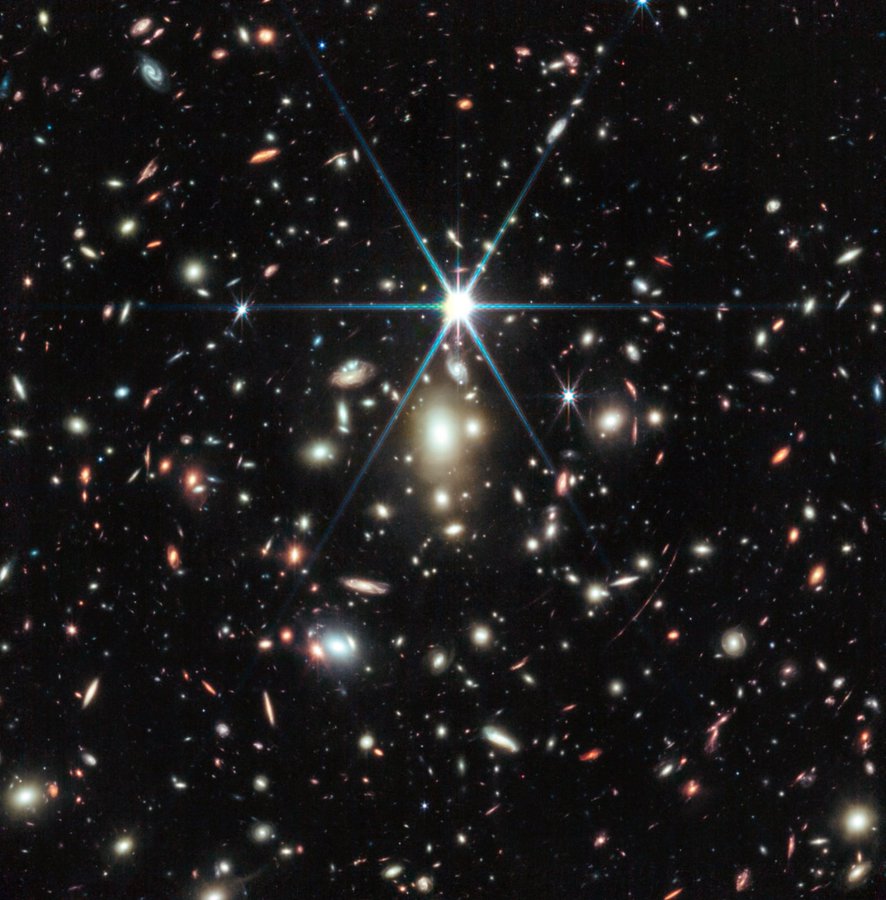 Earendel is only detectable thanks to a galaxy cluster between the star and us. The cluster’s gravity bends light, magnifying what's behind it—in the case of Earendel, by a factor of at least 4000! Based on its colors, astronomers think Earendel may have a cooler companion star.