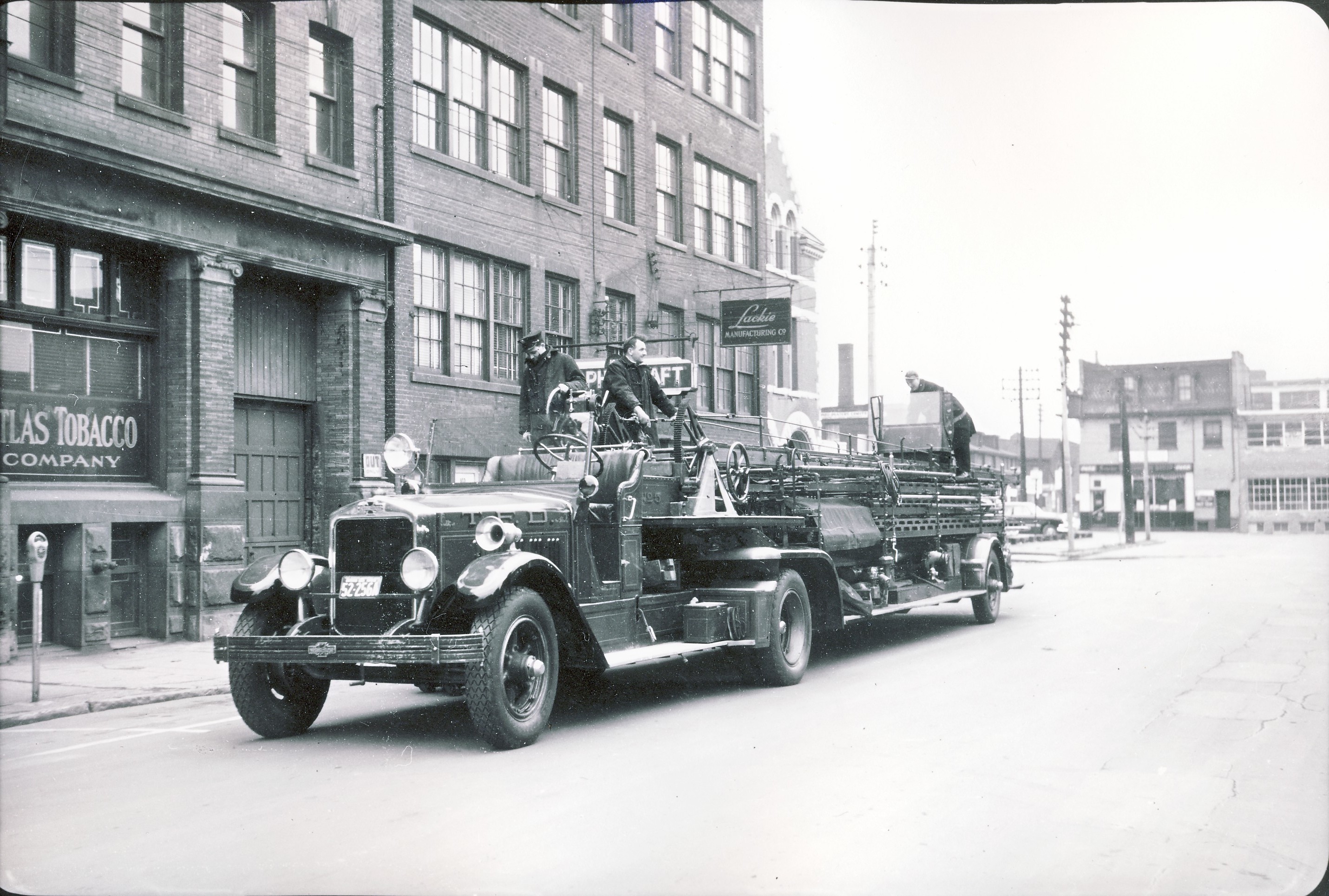 One of the last tillers on the Toronto Fire Department, Aerial 5's 1931 LaFrance Type 217 85' aerial. Shown on Lombard St. on March 6th, 1955.