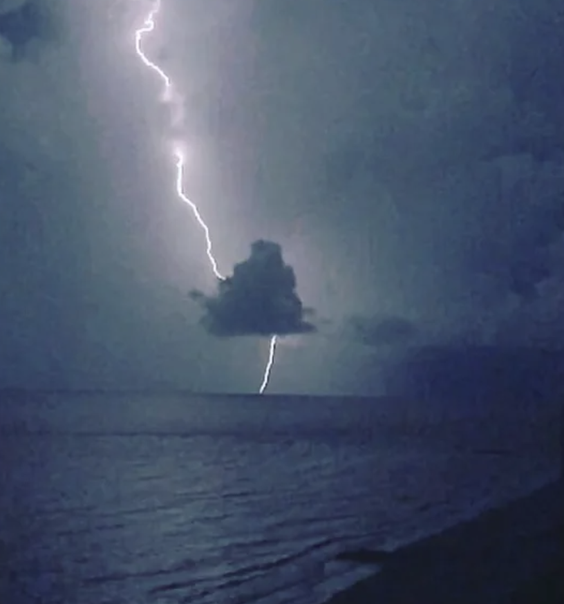 Caught this great shot of a lightning strike from an oncoming storm in FL.