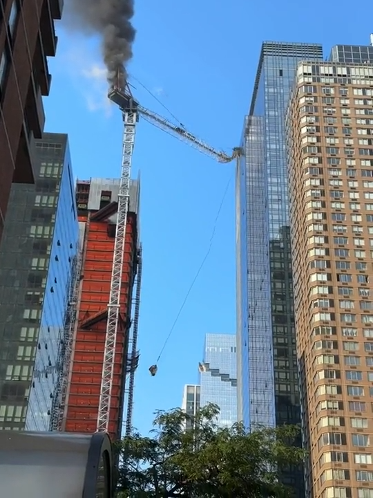 NYC Crane collapse slams into nearby building.