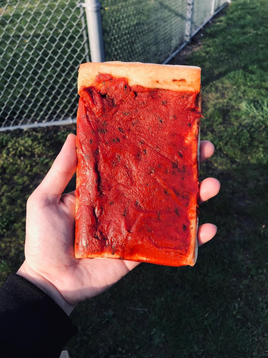 The Rhode Island pizza strip is an embarrassment to pizza everywhere. Is it even pizza, or just tomato sauce bread? You might as well order some bruschetta.