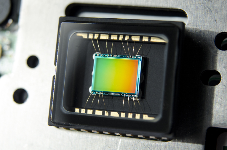 The sensors in digital cameras (including phones) are monochromatic (they don’t “see” color) and have a tiny color filter on each sensor element so it can detect one of three colors (red, green, blue). Then the image is created by calculating what the other two colors might be based on one color value and the values of the nearest sensors around it. tldr; 2/3 of the color in a digital photo is calculated from the 1/3 that is actual data. u/Meta_My_Data