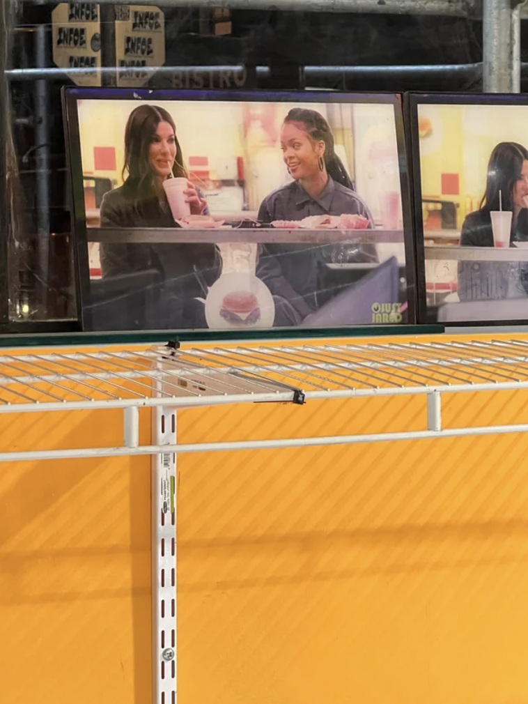 This hotdog restaurant near me has several pictures of Rihanna and Sandra Bullock eating a hot dog there together.