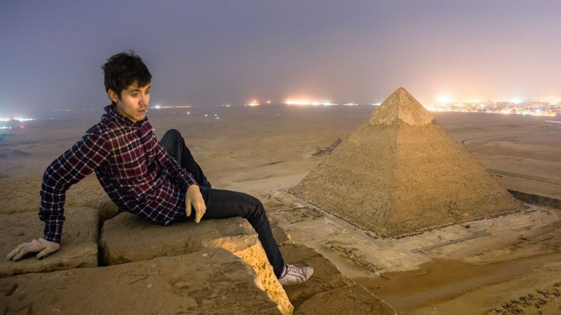 Thrill seekers illegally climb to the top of the Great Pyramid of Giza.