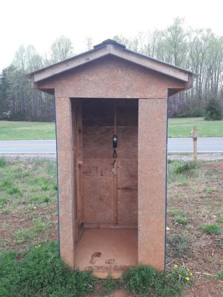 Amish phone booth. Many communities have landline phones. 