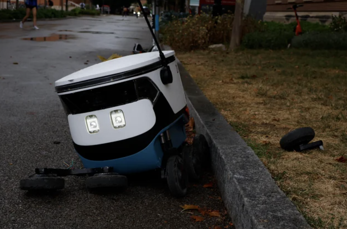 A food delivery robot after being hit by a truck.