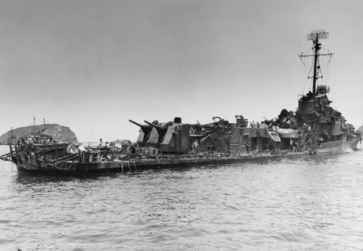 USS Arron Ward after being hit by six kamikazes and two bombs while patrolling Radar Picket Station Ten off Okinawa on May 3, 1945. Forty-two of the crew were lost and the ship was eventually not deemed worth repairing.