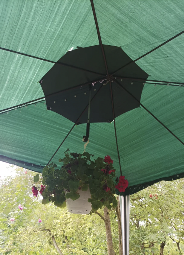 Fixed outdoor tent hole with umbrella.