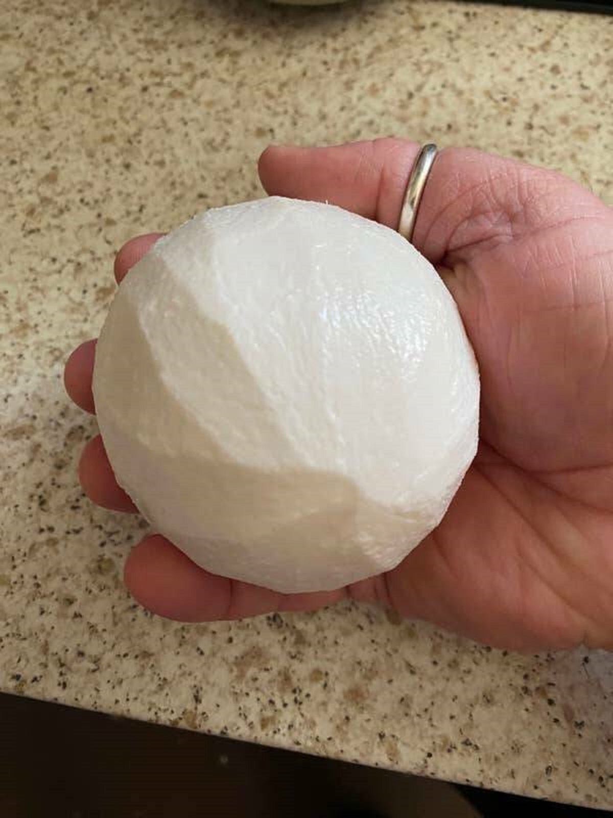 This is what a peeled coconut looks like:
