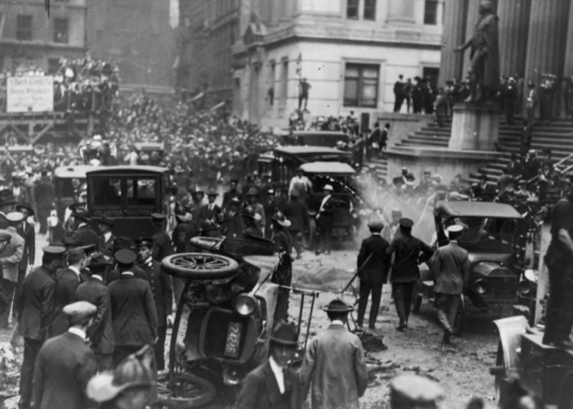 The aftermath of the Wall Street bombing on September 16th, 1920. A horse-drawn cart exploded in front of J.P. Morgan at the corner of Wall and Broad streets. 40 people and one horse were killed.