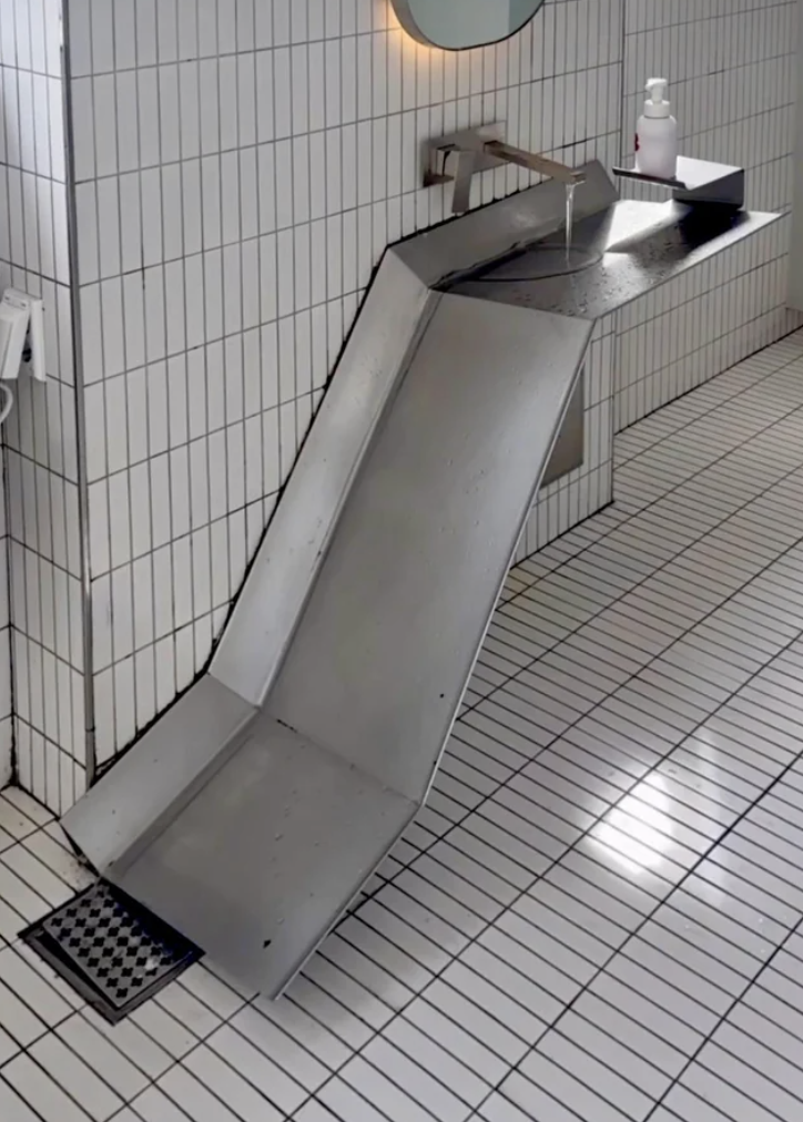 Sink for handwashing drains straight to the floor.