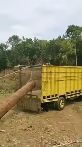 Drive forward = log goes in truck.