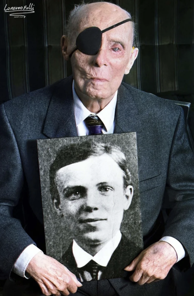 German First World War veteran Hans Lange with a portrait of himself as a 19-year-old in 1918. Photograph taken in 1998.