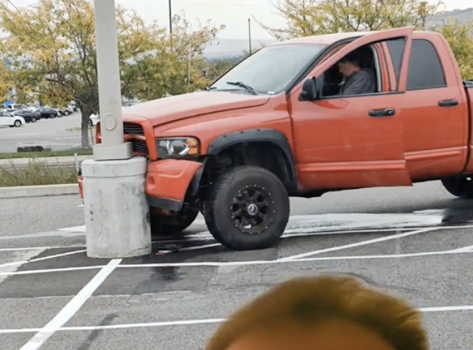20 Clowns Driving Lifted Trucks Who Can't See Where They're Going