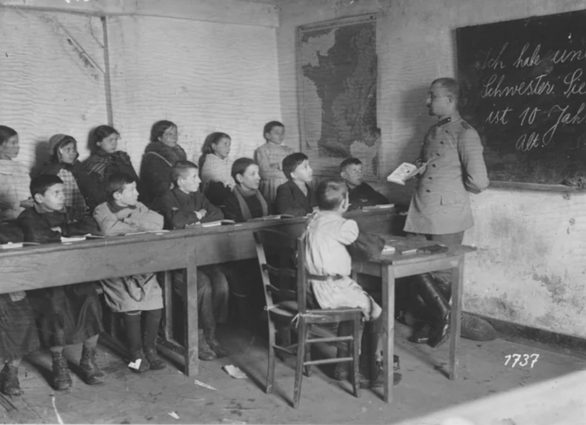 French schoolchildren learn German in Champagne, German-occupied France during the First World War, 1917.