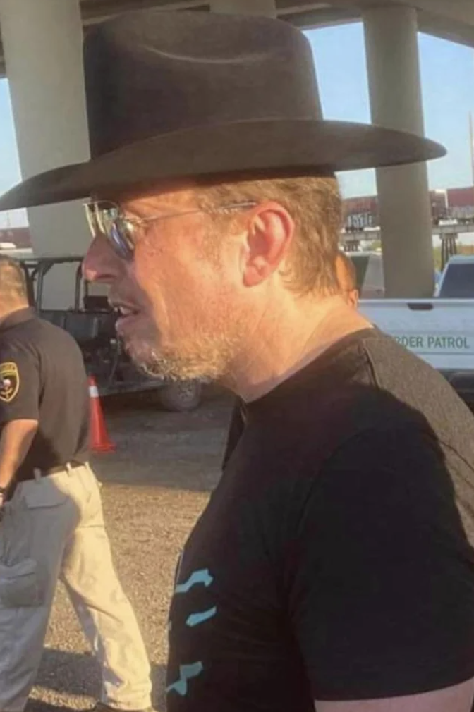Elon Musk visited the border in Eagle Pass TX yesterday wearing a cowboy hat backwards.