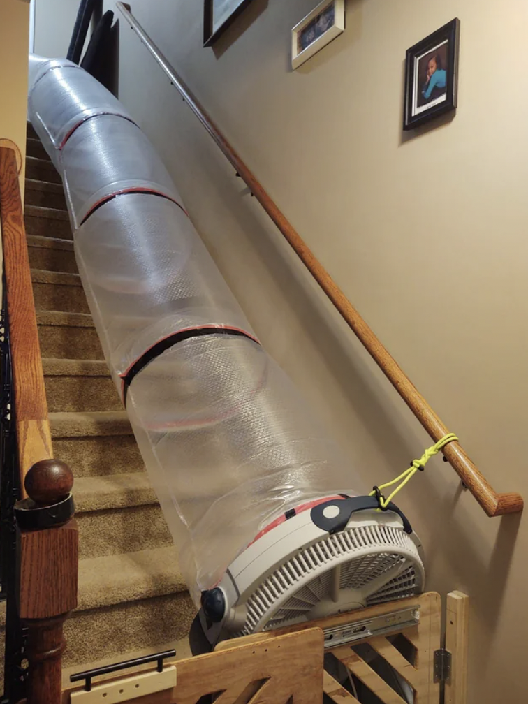 “HVAC on 2nd floor went out, but not on the 1st. Rigged this up to pull cold air from downstairs to upstairs.”