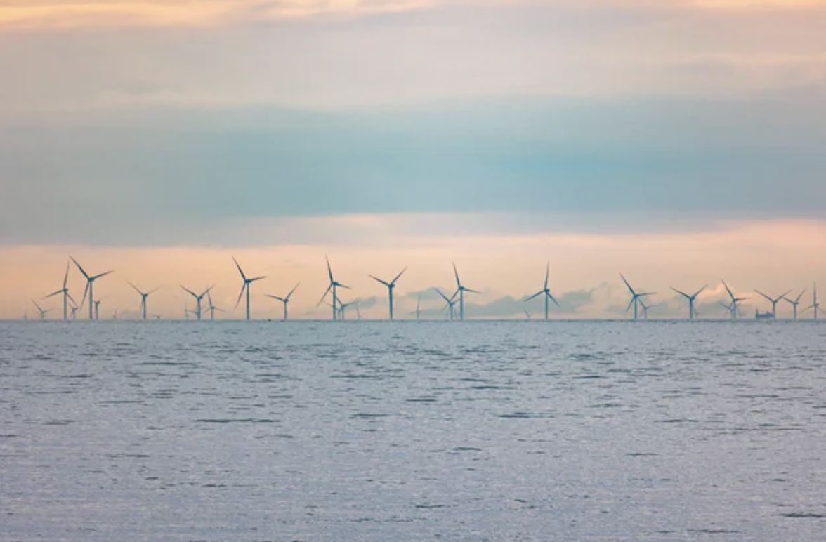 “Flat Earthers' nightmare: wind turbines sinking below the horizon.”