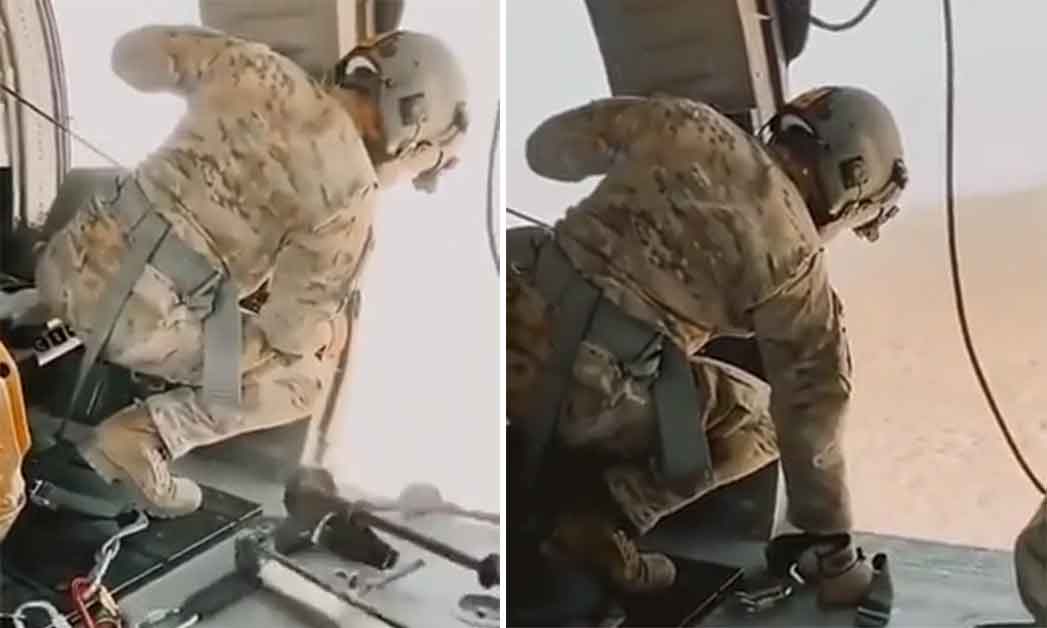 Soldier forgets to strap ladder into helicopter and ends up dropping it.