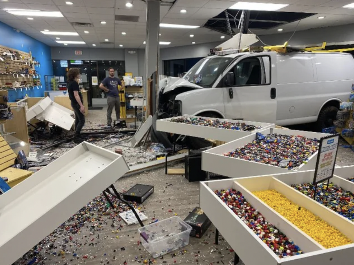 Van crashes into a Lego shop.