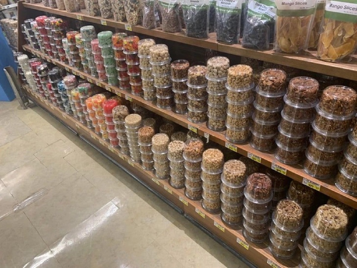 This grocery store displays these nuts and other snacks upside down so you can see the contents more clearly.