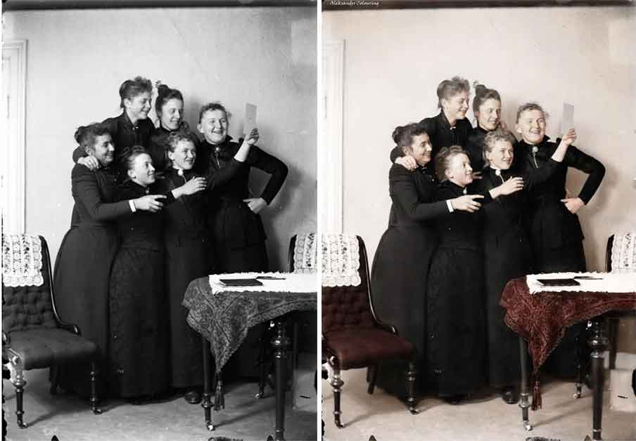 Norwegian women looking at a photo, 1880s.