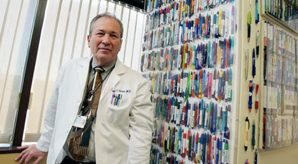 A physician in the US displays his 6-year collection of 1,200+ pens from pharmaceutical reps visiting his office to convince him to prescribe their drugs.