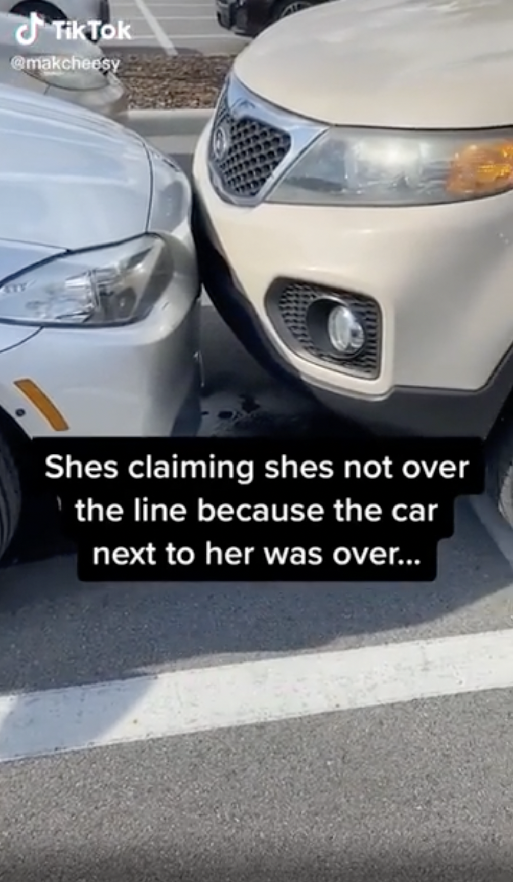bumper - Tik Tok H Shes claiming shes not over the line because the car next to her was over...