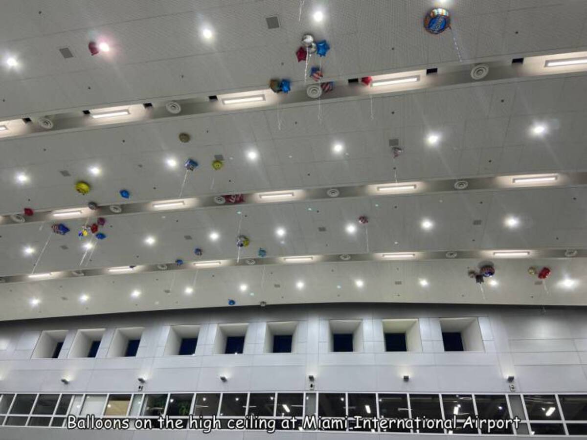 ceiling - Balloons on the high ceiling at Miami International Airport