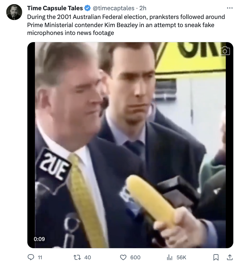 photo caption - Time Capsule Tales During the 2001 Australian Federal election, pranksters ed around Prime Ministerial contender Kim Beazley in an attempt to sneak fake microphones into news footage Una 11 2UE 3 600 il 56K