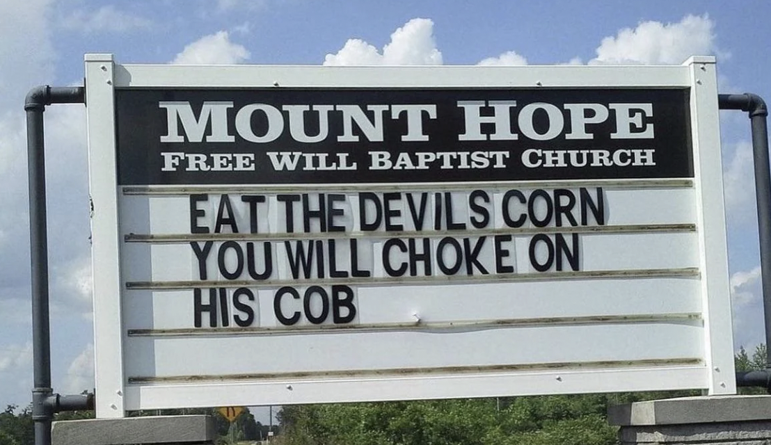 street sign - Mount Hope Free Will Baptist Church Eat The Devils Corn You Will Choke On His Cob
