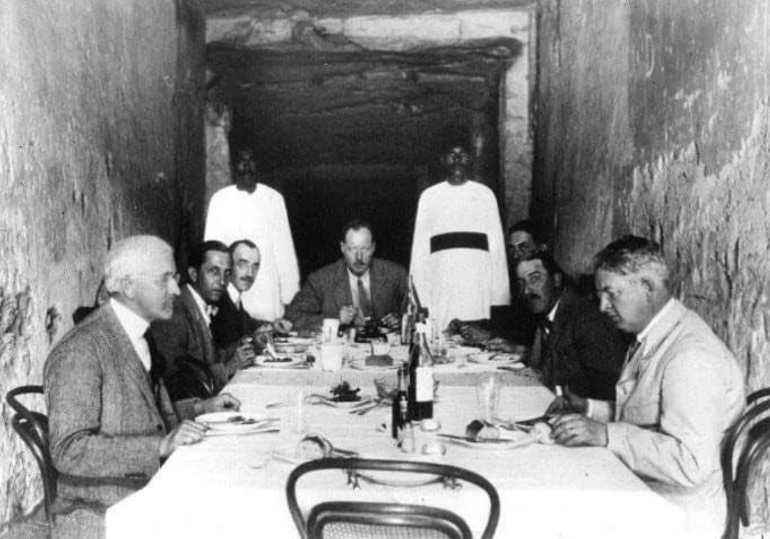 Archaeologists dine in the tomb of Pharaoh Ramses XI, 1923.
