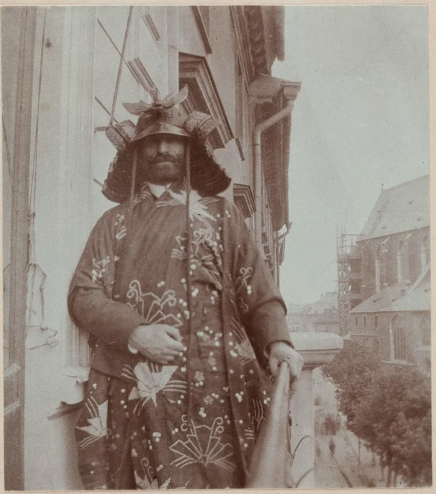 Polish art critic and art collector Feliks "Manggha" Jasieński, 1861-1929, wearing a Samurai helmet and kimono, Kraków, Poland, 1903 or 1904. 