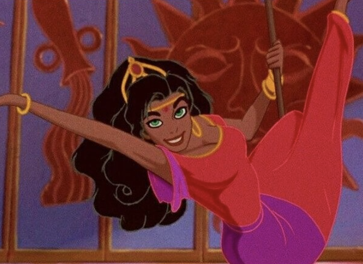 Esmeralda grabs a spear and uses it to dance for an all male audience, who love the show. It’s most definitely pole dancing. 