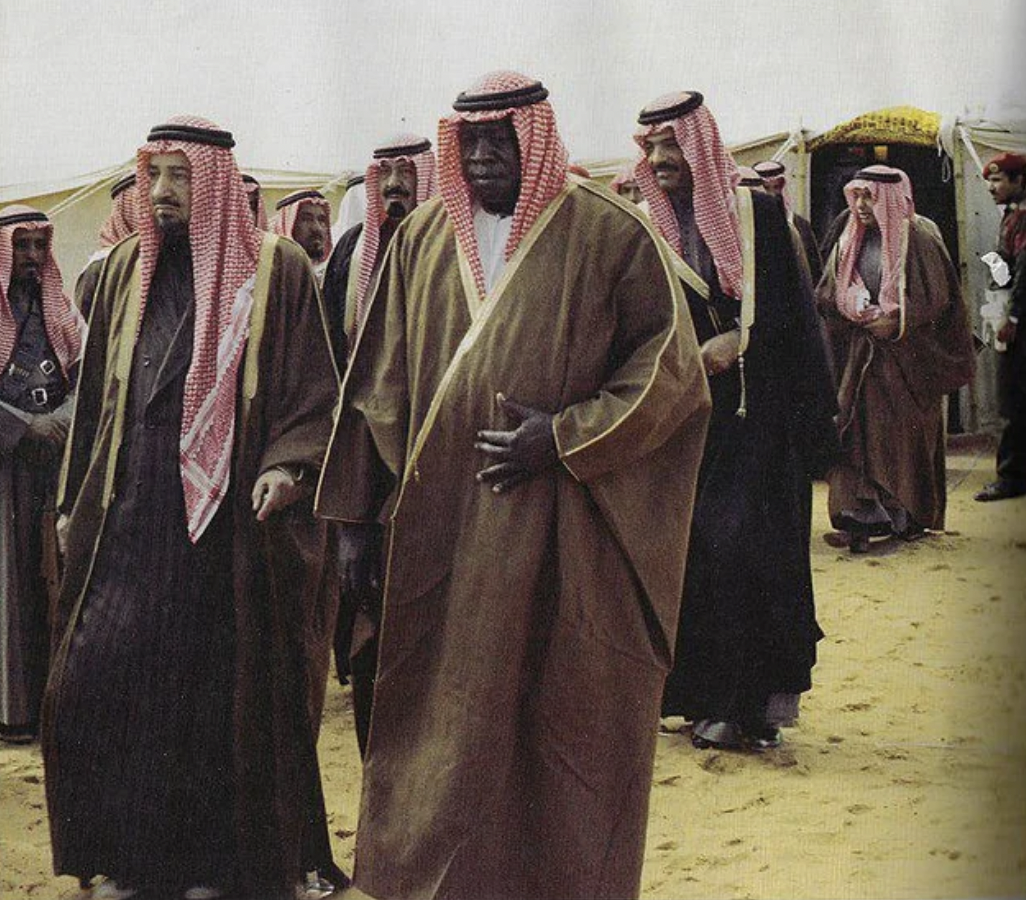 Ugandan dictator Idi Amin in exile in Saudi Arabia in the year following his overthrow, 1980. Nine years later he would briefly ruin his relationship with his Saudi hosts by leaving the country and attempting to reconquer Uganda.