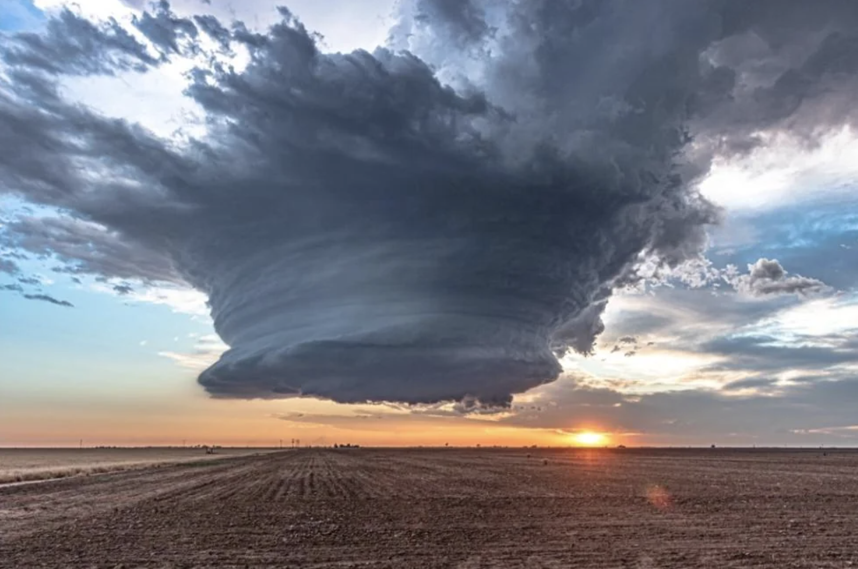 60,000' high supercell in west Texas, gearing up to spawn a tornado and hailstorm