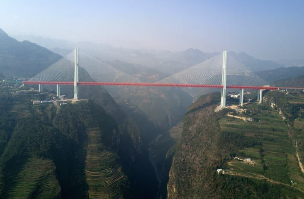 The Beipanjiang Bridge, spanning the Nizhu River in China at a height of 565 meters.