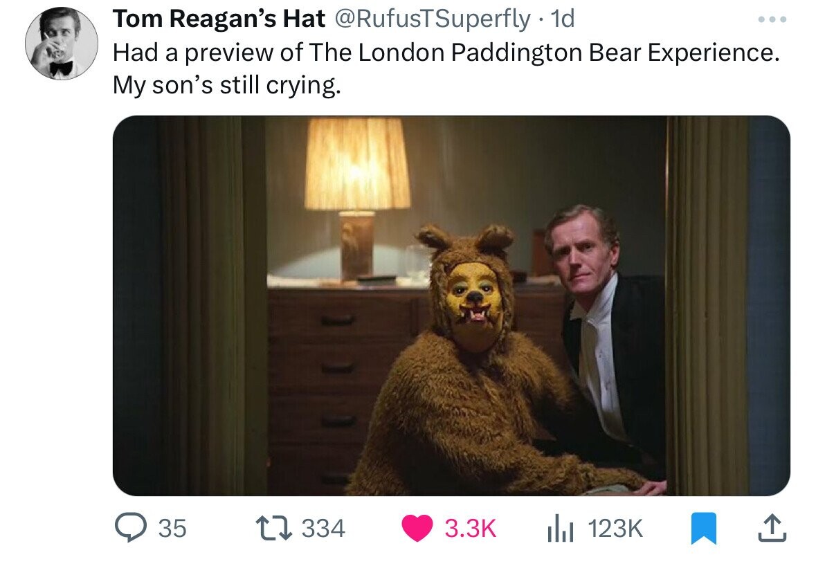 photo caption - Tom Reagan's Hat 1d Had a preview of The London Paddington Bear Experience. My son's still crying. 35 1334 ili