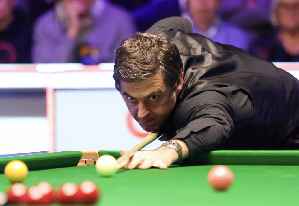 Ronnie O'Sullivan. The reason why he’s great is because not only is he totally unbeatable when he plays his best, but it’s the fact he’s so human as well. He is ridiculously fragile, a slave to his own emotions, goes through phases of really poor mental health, struggles tremendously with the pressure of having to perform, and is his own worst enemy and can implode spectacularly when his head isn’t in it. But, he’s still also the greatest, by some margin. It makes it amazing to watch. You never know what side of him will turn up. It’s like being on the edge of your seat sometimes with the way he plays the game. And being how human he is, the spectators love him because we can see our own human weakness in him but vicariously celebrate as he seems to overcome it.