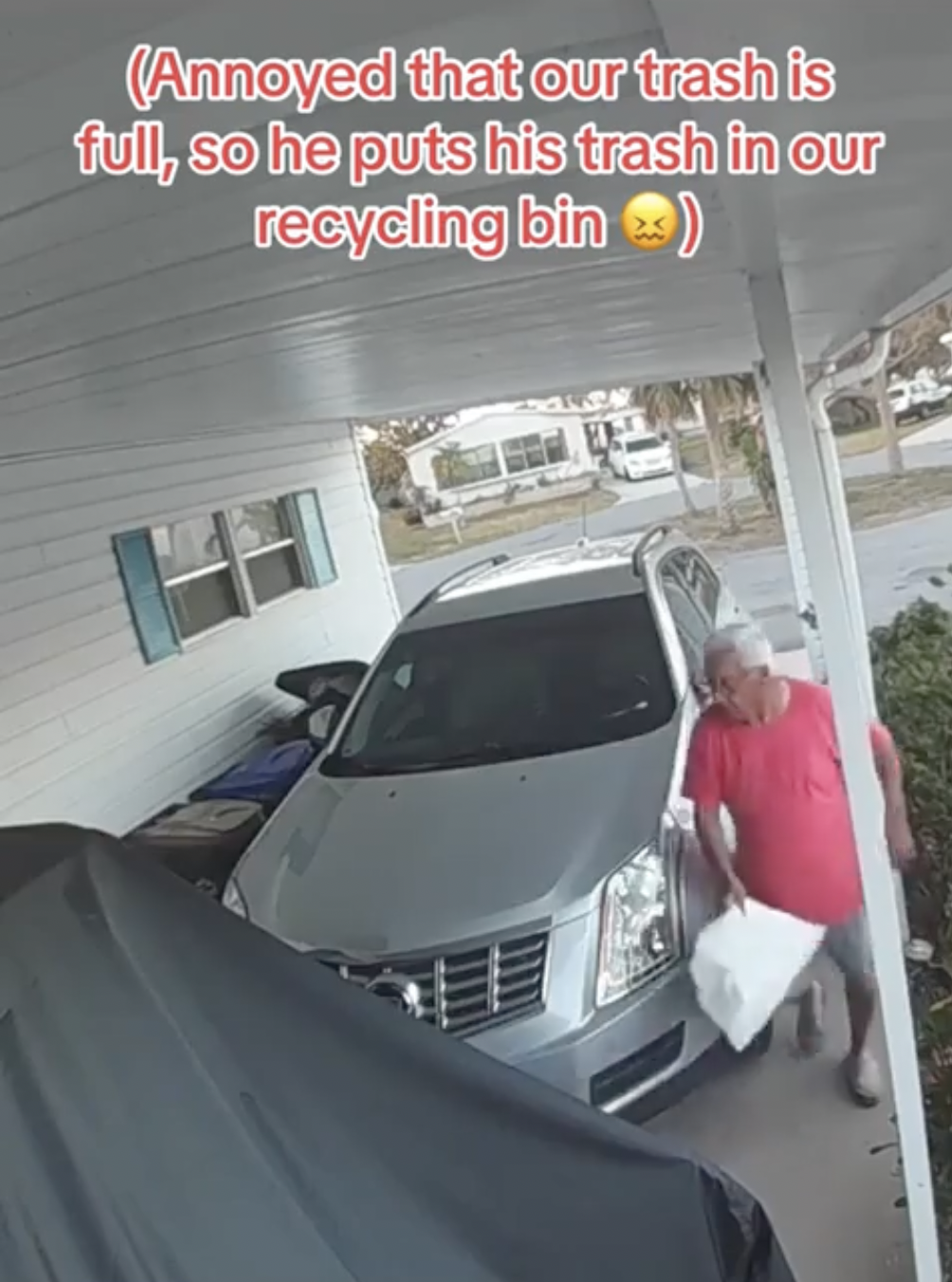 windshield - Annoyed that our trash is full, so he puts his trash in our recycling bin