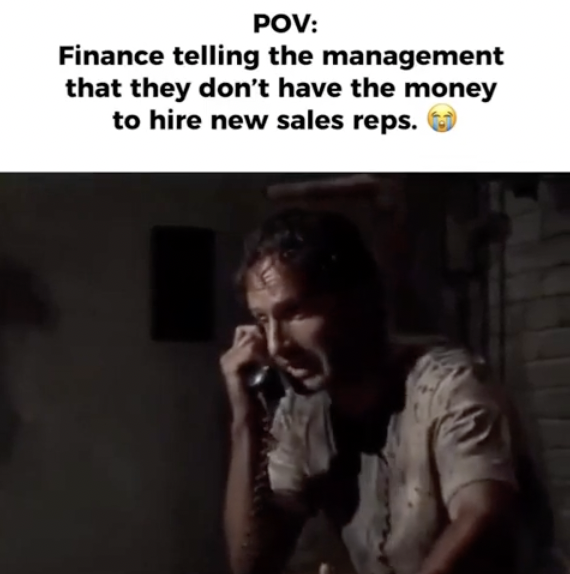 girl - Pov Finance telling the management that they don't have the money to hire new sales reps.