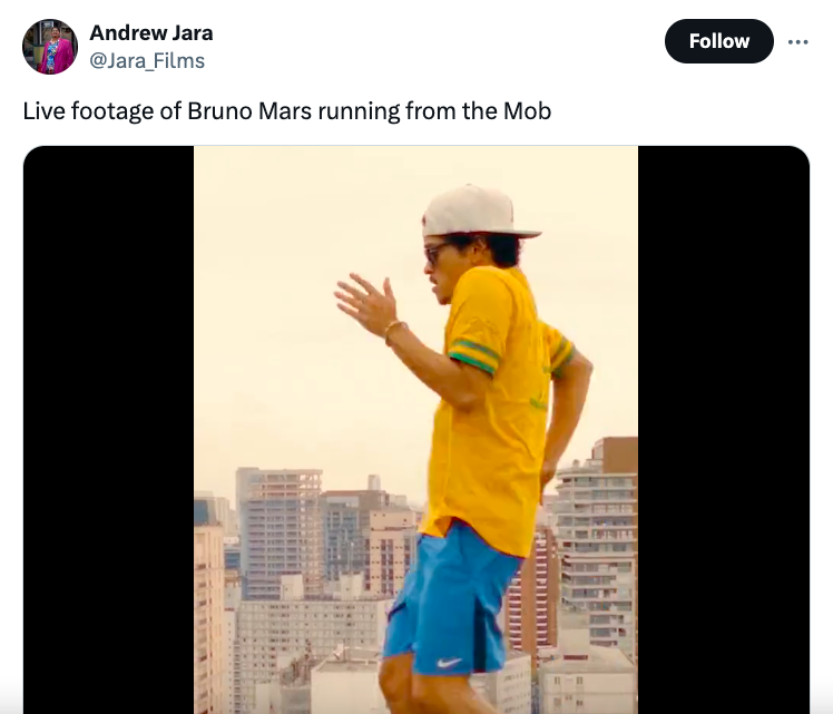 screenshot - Andrew Jara Live footage of Bruno Mars running from the Mob