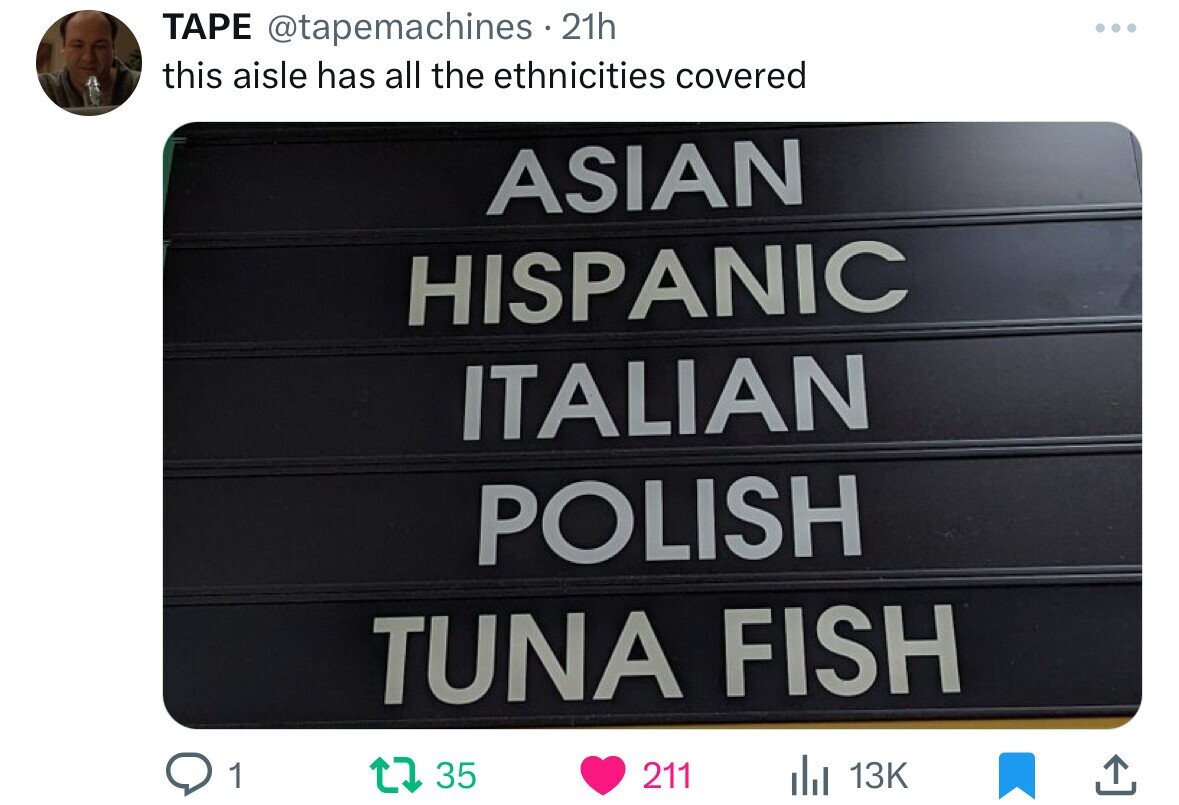 street sign - Tape 21h this aisle has all the ethnicities covered Asian Hispanic Italian Polish Tuna Fish 1 135 211 Il 13K 1