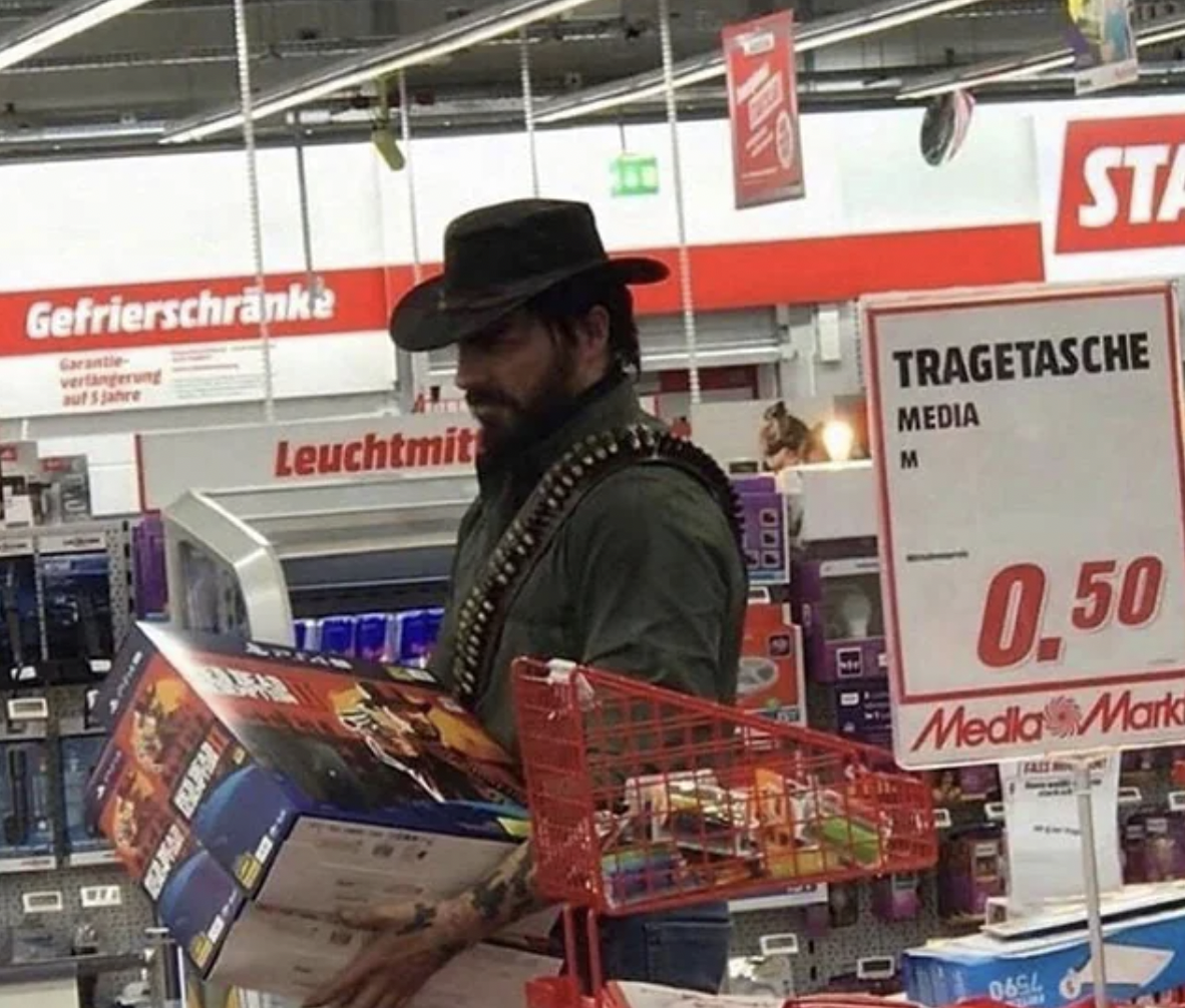 cowboy buying red dead redemption 2